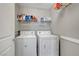 Laundry room featuring side-by-side white washer and dryer at 7870 Formitch Ct, Las Vegas, NV 89166