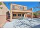 Backyard patio featuring an open air area and a balcony above overlooking the yard at 8429 Spirit Vale Ave, Las Vegas, NV 89117