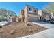 Beautiful home featuring desert landscaping, private gate, and an attached two-car garage at 8429 Spirit Vale Ave, Las Vegas, NV 89117