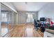 This light-filled bedroom features wood floors and a mirrored closet at 8452 Boseck Dr # 285, Las Vegas, NV 89145