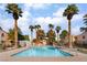 Large community pool with mature landscaping and secure fencing at 8452 Boseck Dr # 285, Las Vegas, NV 89145