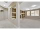 Bright room with carpet and view of custom shelving at 8605 Wild Diamond Ave, Las Vegas, NV 89143