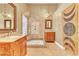 Well-lit bathroom featuring a glass-enclosed shower and decorative accents at 8629 Estrelita Dr, Las Vegas, NV 89128