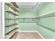 Walk-in closet offering ample storage with shelves and clothing rods at 8629 Estrelita Dr, Las Vegas, NV 89128