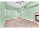 Modern living room featuring tile floors, fireplace, and a bright open space at 8629 Estrelita Dr, Las Vegas, NV 89128