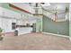 Spacious open-concept living room and kitchen with modern decor and neutral color palette at 8629 Estrelita Dr, Las Vegas, NV 89128