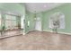 Bright living room featuring tile floors, arched windows, and a modern design at 8629 Estrelita Dr, Las Vegas, NV 89128