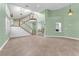 Grand living room with tile floors, staircase, and elegant decor at 8629 Estrelita Dr, Las Vegas, NV 89128