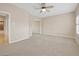 Large bedroom featuring a ceiling fan, carpet floors and recessed lighting at 8970 Lansberry Ct, Las Vegas, NV 89147