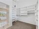 Walk-in closet with ample shelving and storage space, perfect for organization at 8970 Lansberry Ct, Las Vegas, NV 89147