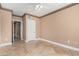 Bedroom featuring marble floors, neutral walls, ceiling fan and entry door at 9000 Las Vegas Blvd # 2243, Las Vegas, NV 89123