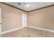 Neutral bedroom featuring marble floors, base trim, ceiling fan, and large closet door at 9000 Las Vegas Blvd # 2243, Las Vegas, NV 89123