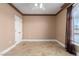 Empty bedroom featuring tile floors and a window with blinds at 9000 Las Vegas Blvd # 2243, Las Vegas, NV 89123