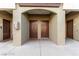 Exterior view of condominium entrances showcasing unit doors and exterior architecture under covered entryway at 9000 Las Vegas Blvd # 2243, Las Vegas, NV 89123