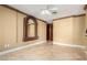 Spacious living room with decorative mirror and tile flooring at 9000 Las Vegas Blvd # 2243, Las Vegas, NV 89123