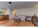 A view of the open floor plan shows the living room and kitchen area with hardwood floors at 905 Rockview Dr # 101, Las Vegas, NV 89128