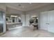 Expansive bathroom featuring dual vanities and a glass-enclosed shower at 9325 Verlaine Ct, Las Vegas, NV 89145