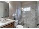 Contemporary bathroom showcasing a glass shower and updated vanity at 9325 Verlaine Ct, Las Vegas, NV 89145