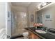 Stylish bathroom showcasing a frameless glass shower and sleek vanity at 9325 Verlaine Ct, Las Vegas, NV 89145