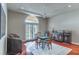 An elegant living room with a game table and outside access at 9325 Verlaine Ct, Las Vegas, NV 89145