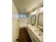 Modern bathroom with double sinks, marble counters, and sleek fixtures at , Las Vegas, NV 89121