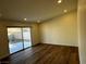 Living room featuring recessed lights, wood flooring, and sliding glass door to backyard at , Las Vegas, NV 89121