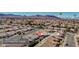 Neighborhood aerial view of homes with mountain backdrop and location to M Resort and South Point Casino at 1006 Blue Lantern Dr, Henderson, NV 89015