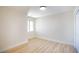 Neutral bedroom with wood-look tile flooring, a window, and a closet at 1006 Blue Lantern Dr, Henderson, NV 89015