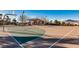 Community outdoor basketball court on sunny day has new nets, surrounded by trees and desert landscaping at 1059 Via Saint Lucia Pl, Henderson, NV 89011