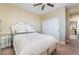 Inviting bedroom boasts a decorative headboard, side tables and closet at 1059 Via Saint Lucia Pl, Henderson, NV 89011