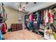 Walk-in closet providing ample storage space for clothes and accessories at 1059 Via Saint Lucia Pl, Henderson, NV 89011