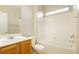 Bathroom featuring vanity sink and bathtub with tile surround at 11204 Newbury Hills Ave, Las Vegas, NV 89138