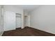 Bedroom featuring closet with sliding doors and separate entry door at 11204 Newbury Hills Ave, Las Vegas, NV 89138