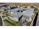 An aerial view features the gray roof of a modern home in a suburban neighborhood at 11296 Villa Bellagio Dr, Las Vegas, NV 89141