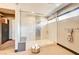 Modern shower room featuring glass enclosure, mosaic tile, and built-in bench at 11296 Villa Bellagio Dr, Las Vegas, NV 89141