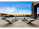 Modern pool with lounge chairs, perfect for relaxing and soaking up the sun at 11296 Villa Bellagio Dr, Las Vegas, NV 89141