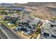 View of rear of home with mountain backdrop, pool, spa, and outdoor space at 11296 Villa Bellagio Dr, Las Vegas, NV 89141