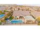 Beautiful aerial view of the home highlighting the backyard pool, patio area, and the surrounding neighborhood at 12217 Tempestad Ave, Las Vegas, NV 89138