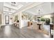 Elegant dining area featuring wainscoting and stylish decor, seamlessly connected to the entryway at 12217 Tempestad Ave, Las Vegas, NV 89138