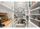 Well-organized walk-in pantry with custom shelving, drawers, and counter space for efficient storage and convenience at 12217 Tempestad Ave, Las Vegas, NV 89138