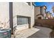 A view of the backyard concrete patio and the stucco exterior of the house at 2049 Audrey Hepburn St, Las Vegas, NV 89142