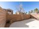 Enclosed backyard featuring a concrete patio area and block wall fencing at 2049 Audrey Hepburn St, Las Vegas, NV 89142