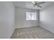 Cozy bedroom featuring neutral carpeting and a bright window at 2049 Audrey Hepburn St, Las Vegas, NV 89142