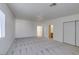 Spacious main bedroom with walk-in closet, ceiling fan, and plush carpeting at 2049 Audrey Hepburn St, Las Vegas, NV 89142