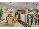 Elegant dining area adjacent to the breakfast bar in an open layout at 2050 Los Feliz St # 112, Las Vegas, NV 89156