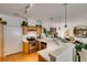 Kitchen with stainless steel appliances, wooden cabinets, breakfast bar, and pendant lighting at 2050 Los Feliz St # 112, Las Vegas, NV 89156