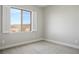 Bright bedroom with large windows and plantation shutters offering scenic neighborhood views at 2176 De Narvik Dr, Henderson, NV 89044