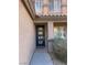 Inviting front entrance with a modern door and manicured landscaping at 2176 De Narvik Dr, Henderson, NV 89044