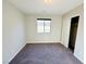 Bedroom features plush carpeting, a ceiling light, and a sliding-door closet at 2241 Chandler Ranch Pl, Laughlin, NV 89029