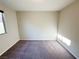 Neutral bedroom with plush carpeting and a bright window at 2241 Chandler Ranch Pl, Laughlin, NV 89029